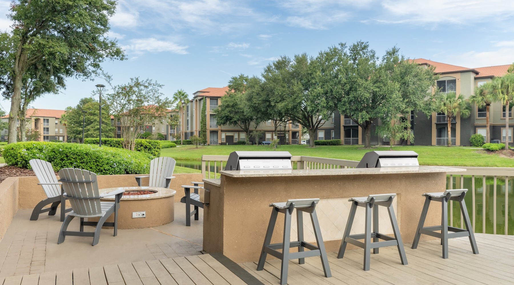a table grills and chairs outside